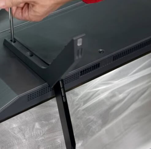 Tighten the screw and Install the LG TV Stand