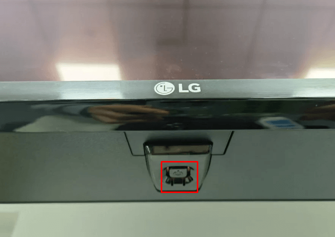 Find the Power button at the bottom side of LG Smart TV